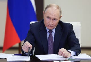 Russia's president Vladimir Putin chairs a meeting on Russia's language policy at the Novo-Ogaryovo state residence outside Moscow